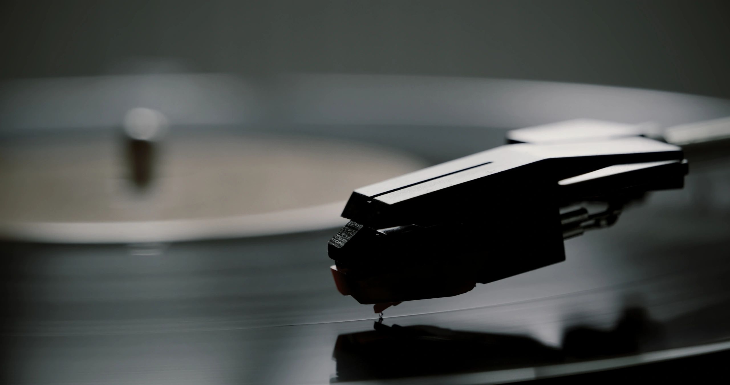 Vinyl record playing on a turntable