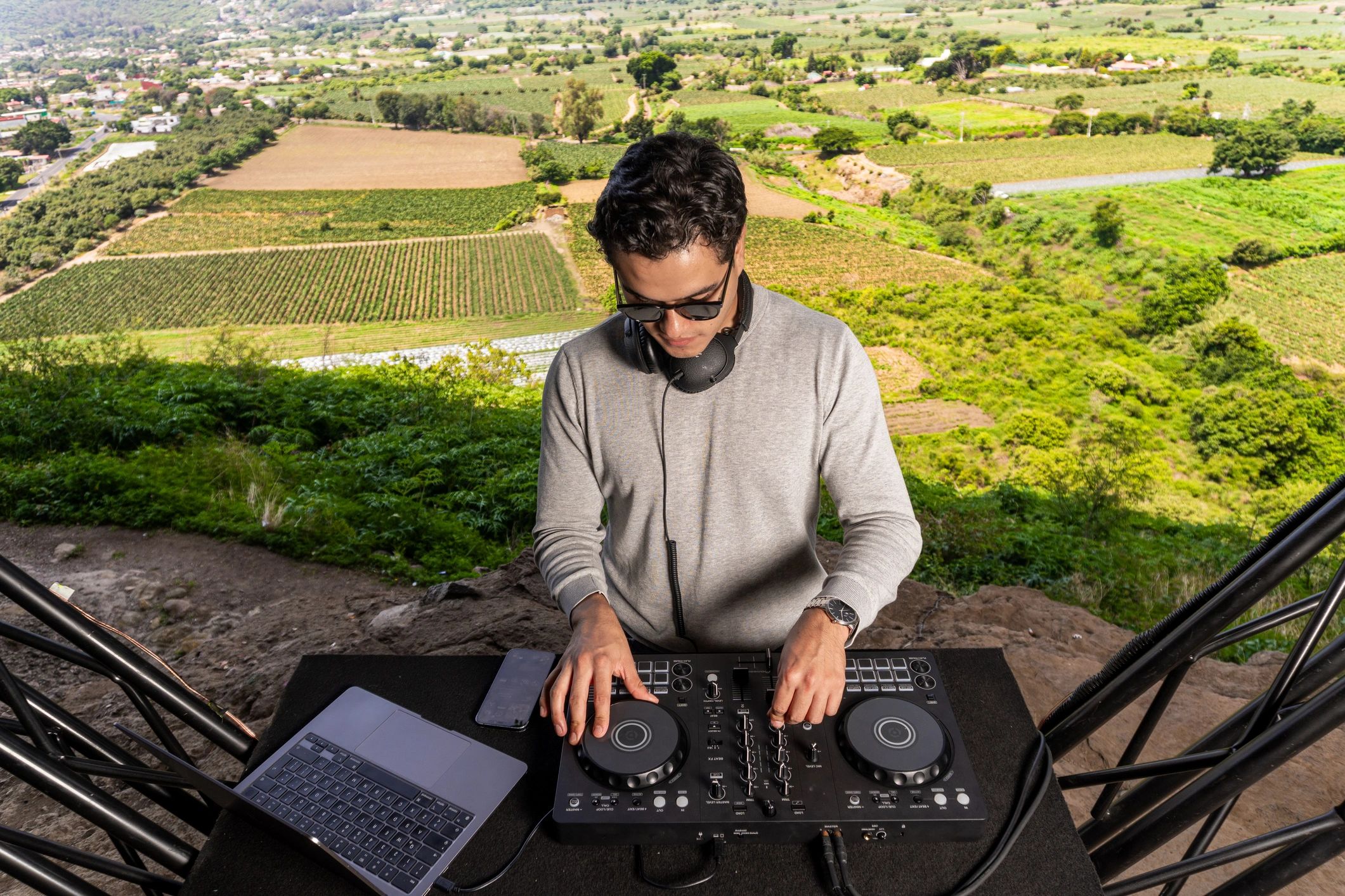 DJ performing with turntables during a live music set