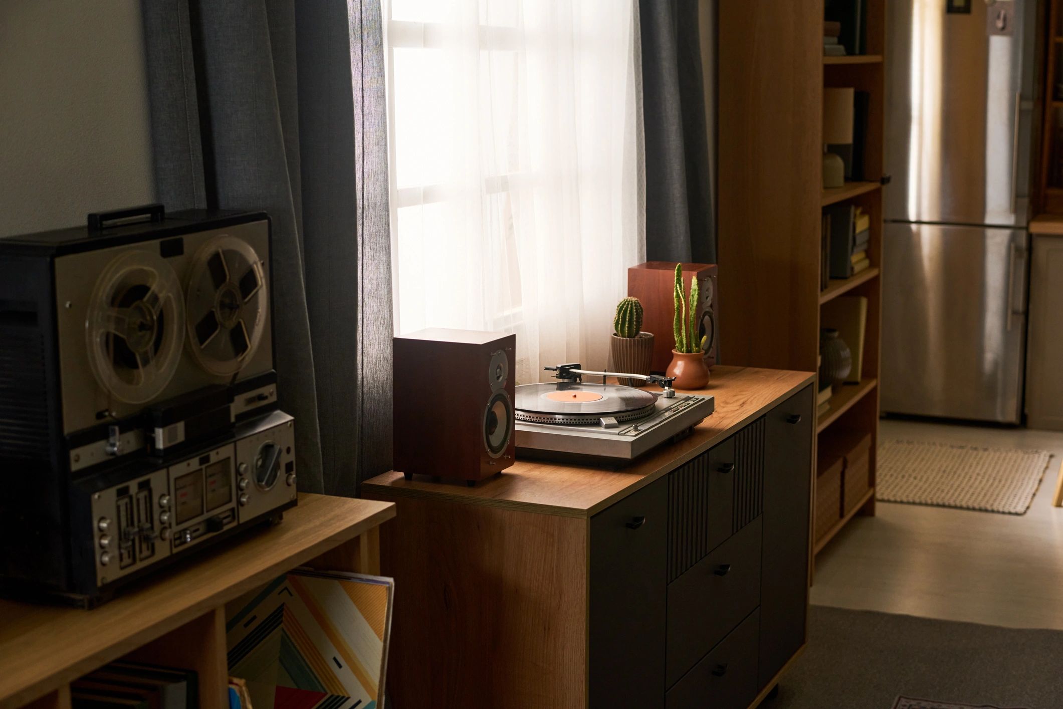 Vintage turntable playing a vinyl record