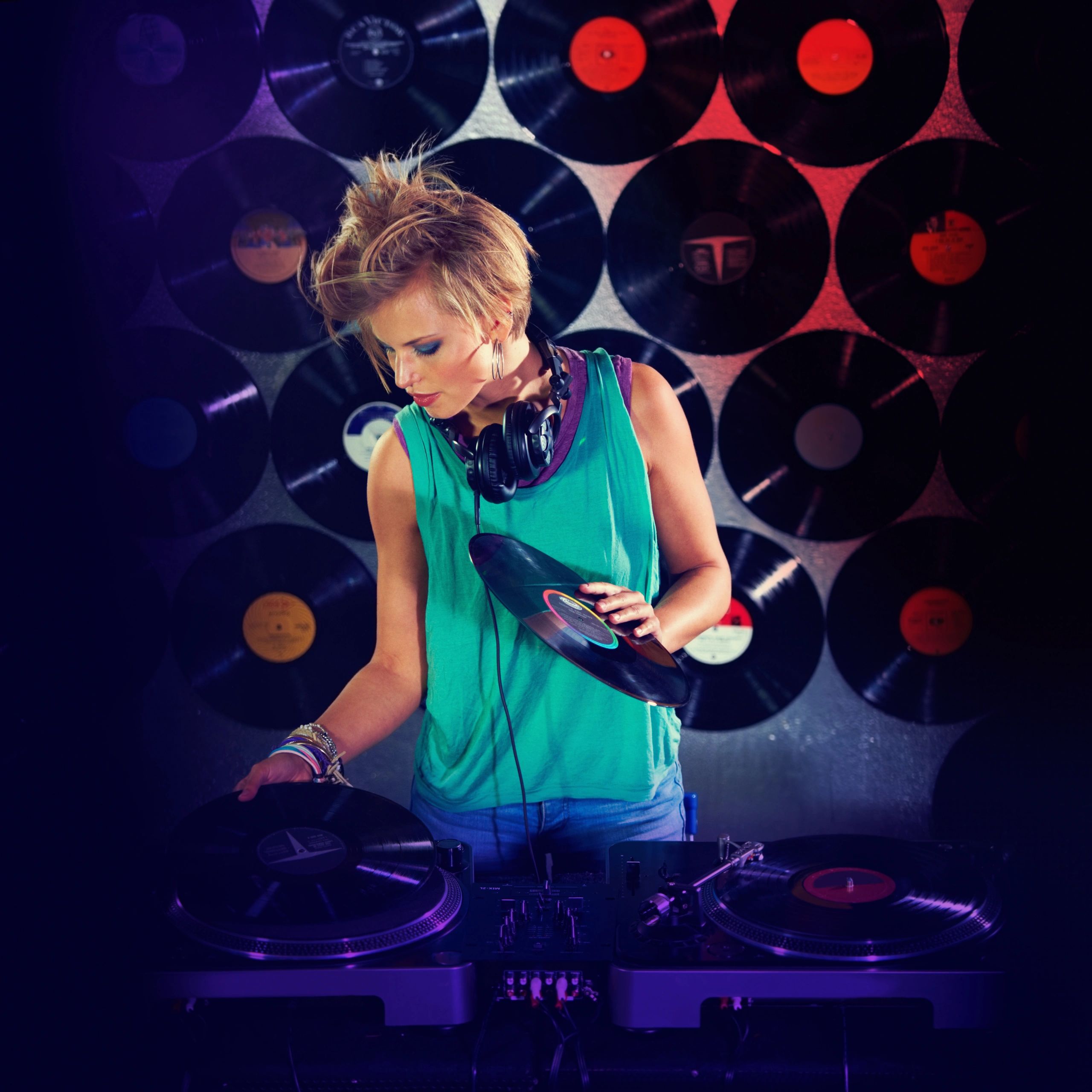DJ selecting records in a radio studio